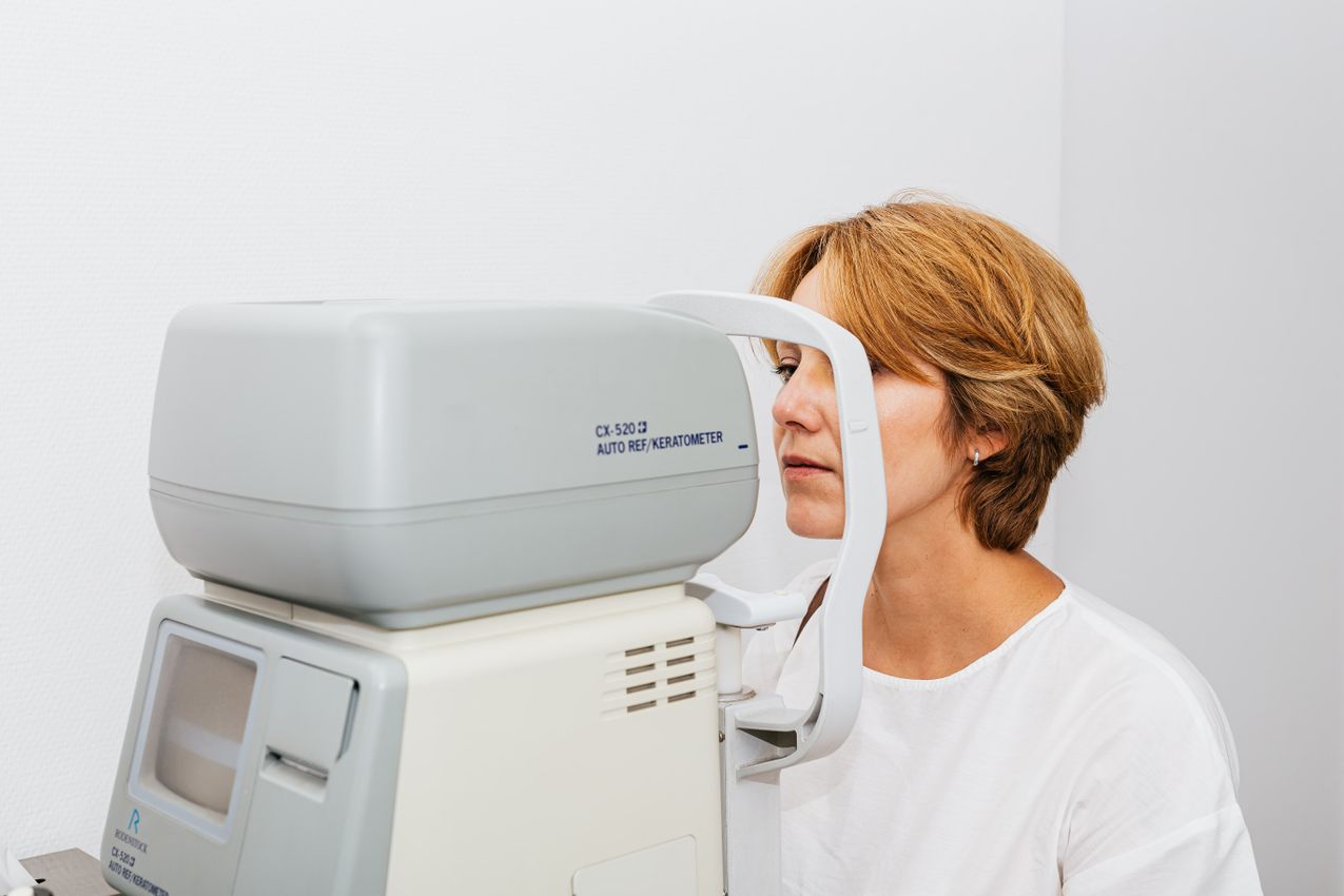 Tonometer measuring intraocular pressure during an eye examination